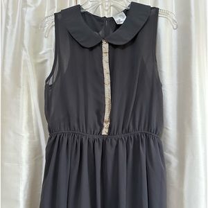 Jella Couture.  Gray dress with gold accent.  Lined. L